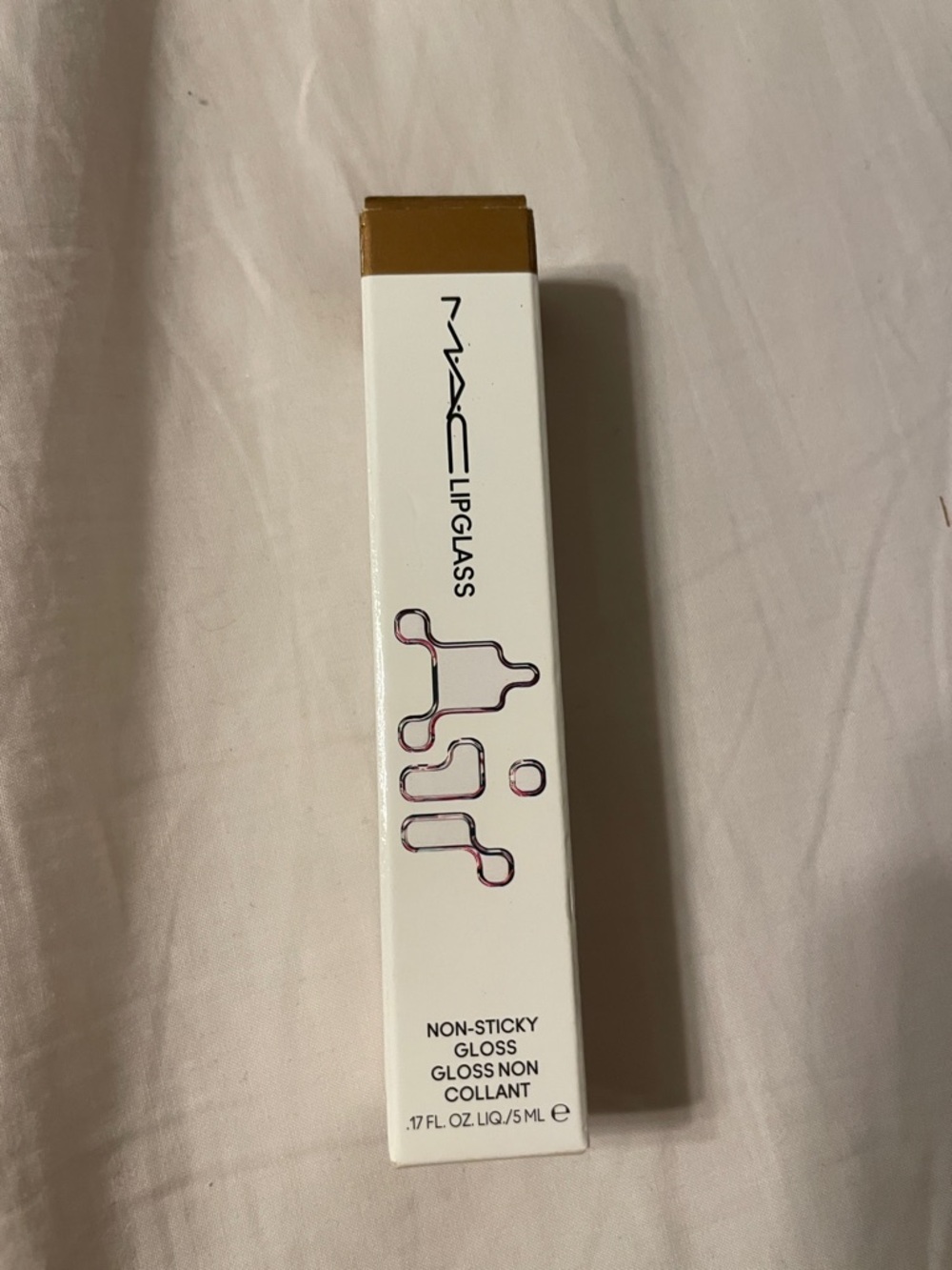 MAC Lipglass Shimmering Bronze Gloss with Gold Accents- accolade
